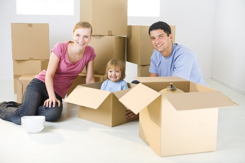 House movers preparing a Surrey home move with boxes and furniture