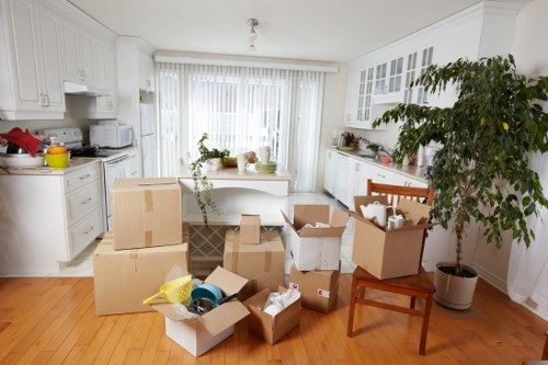 Loading boxes and furniture into a moving van in Surrey
