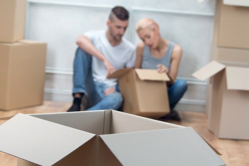 Driver assisting with a residential or office collection in Surrey
