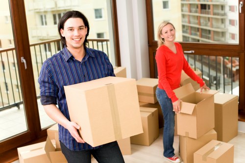 Local moving van helping with furniture transport in Surrey